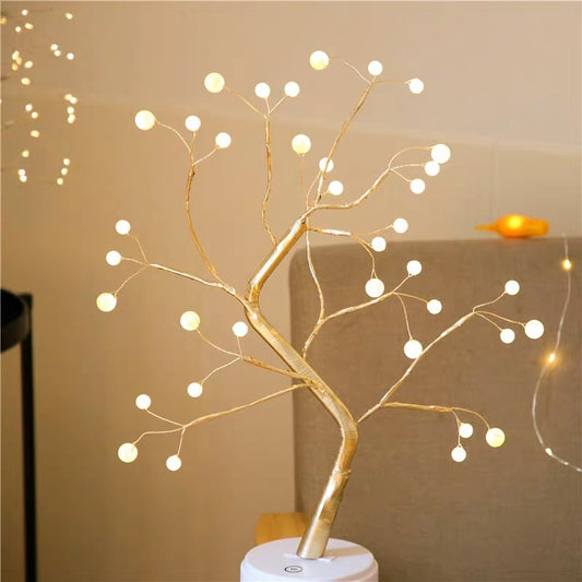 Decorative LED branch with lights on a beige background - Lioré® USA