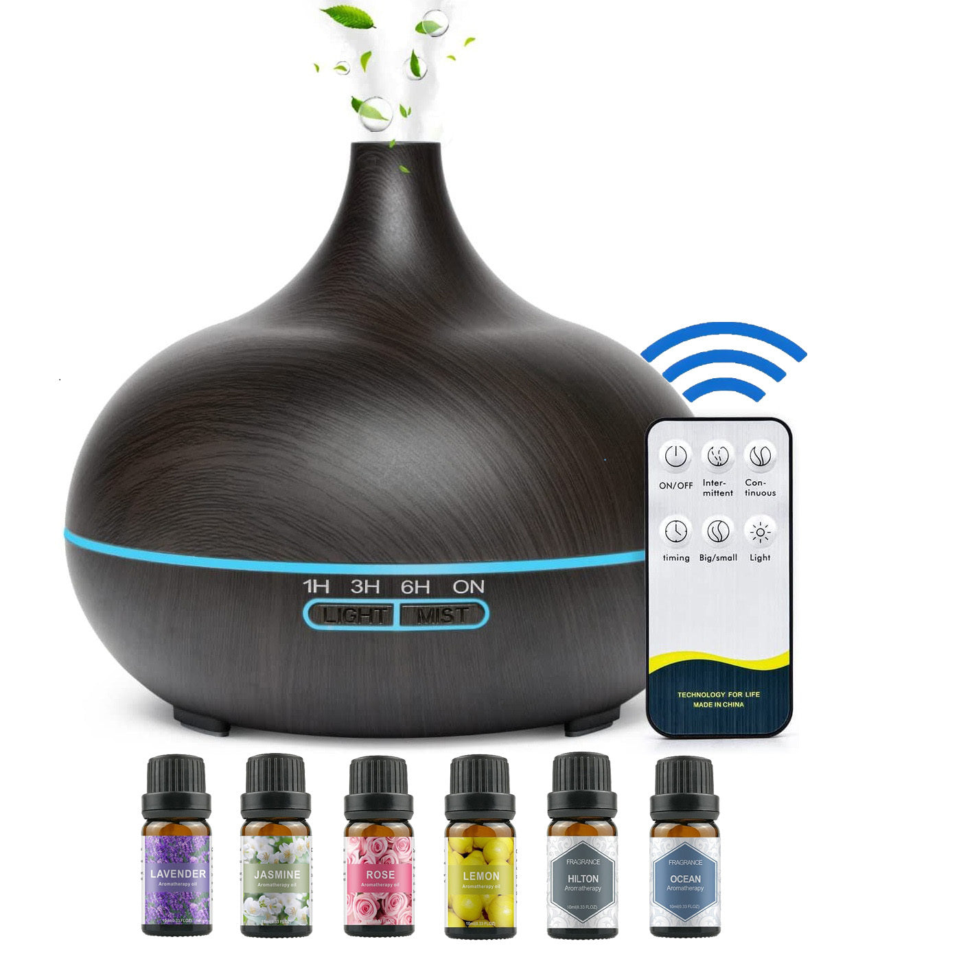 Aromatherapy diffuser with remote control and essential oil bottles on a white background - Lioré®