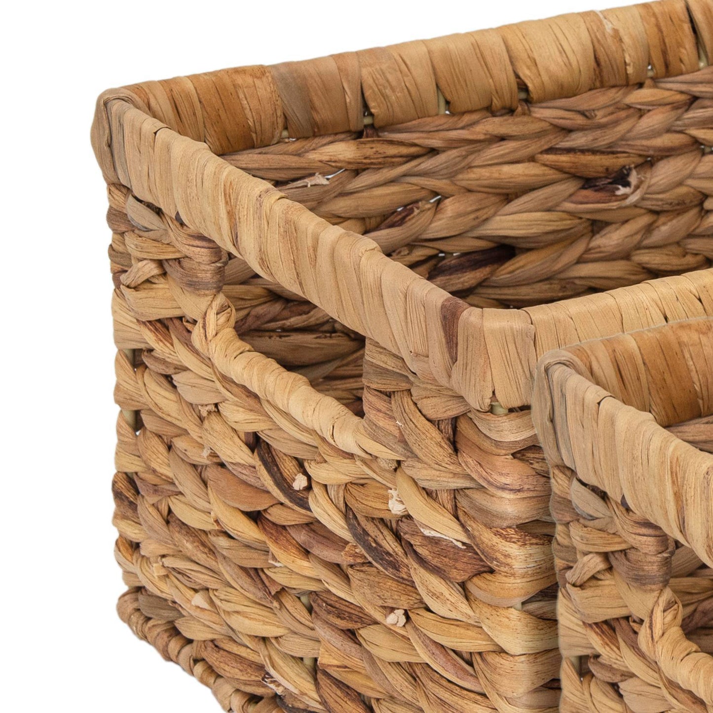 Close-up of a woven basket with natural brown tones on a white background - Lioré®