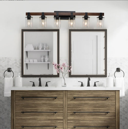 Bathroom vanity with double mirrors, lights, and decorative elements. - Lioré® USA