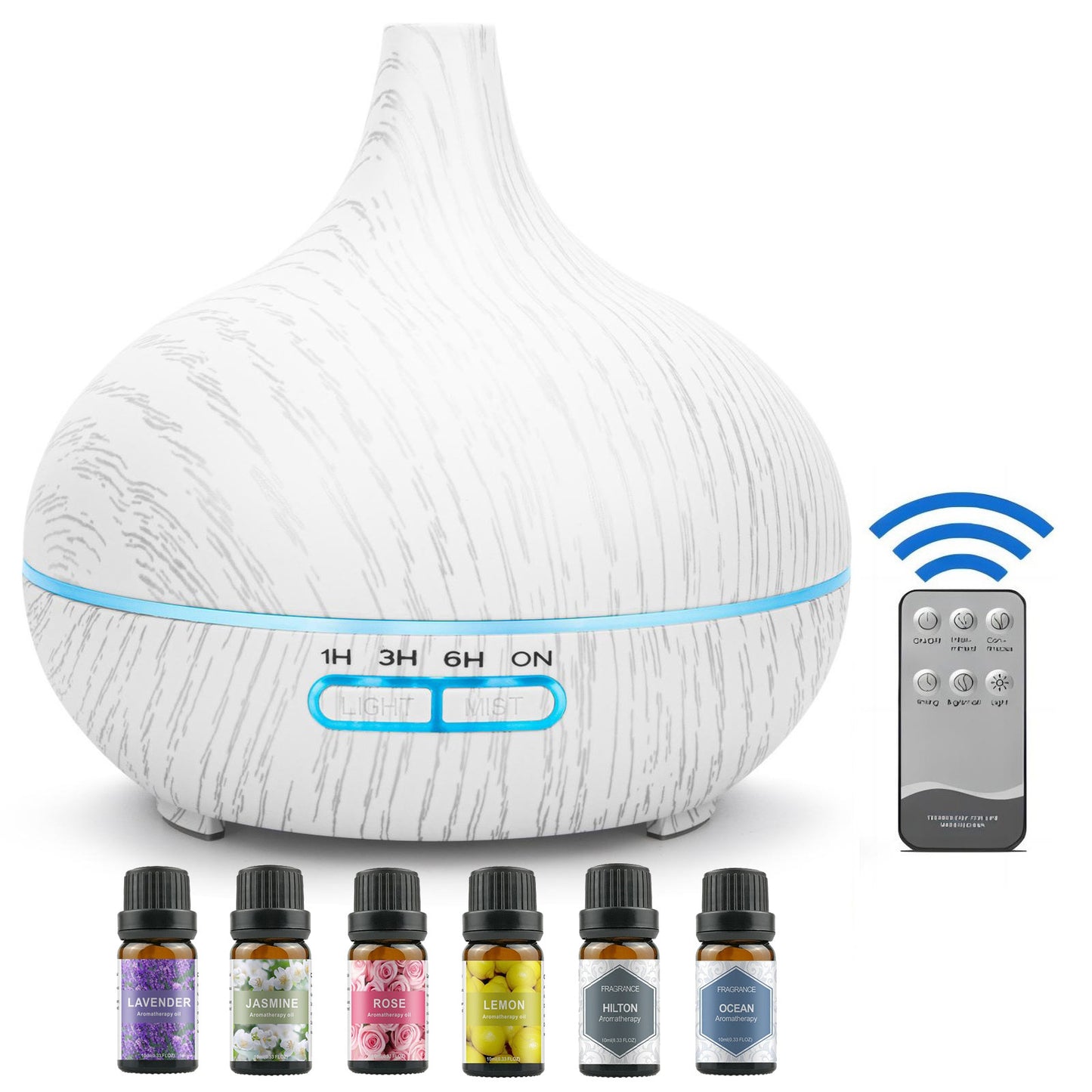White diffuser with remote control and essential oil bottles on a white background - Lioré®