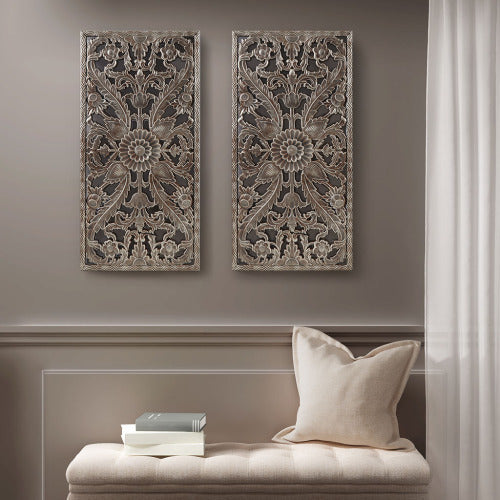 Decorative wall panels with floral patterns on a neutral wall above a bench with pillows and books. - Lioré® USA