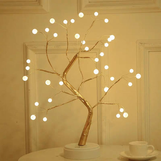 Decorative LED tree with lights on a neutral background - Lioré® USA
