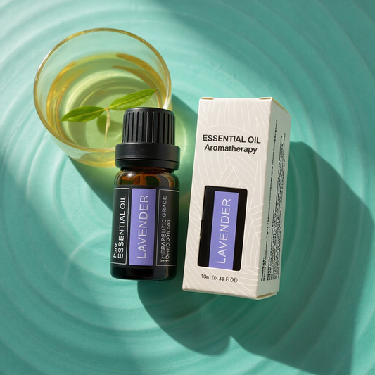 Lavender essential oil bottle and box on a teal background - Lioré®