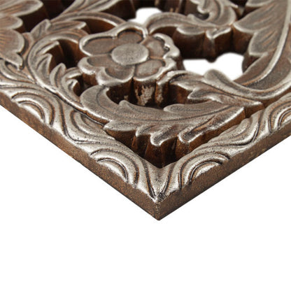 Decorative metal grille of wall panel with floral design on a white background - Lioré® USA