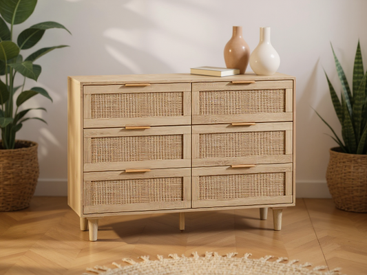 rattan dresser with wicker drawers in a room with plants and a rug. - Lioré® USA